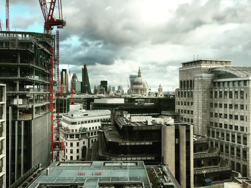high-angle-view-buildings-against-cloudy-sky